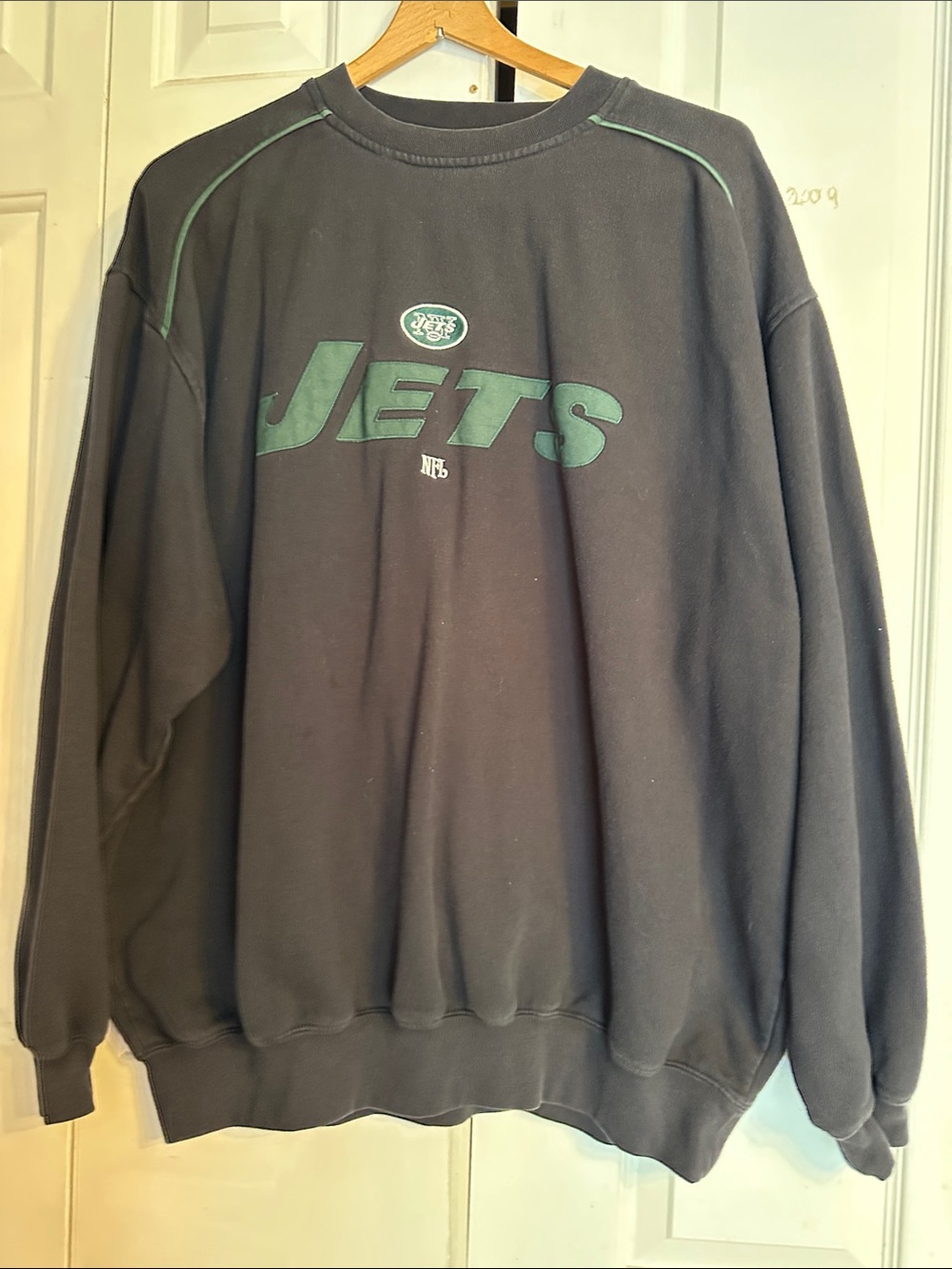NFL Black Crewneck Sweatshirt with Green Jets Logo